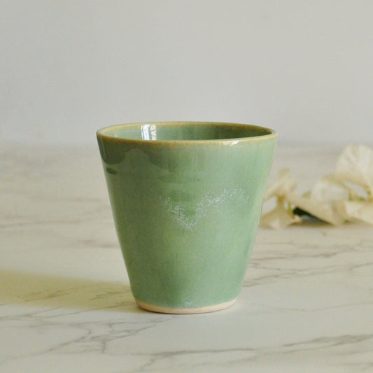 Handmade ceramic shot glass, made in stoneware clay and glazed in Magic Mint green glaze.